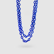 Playful chain necklace from 3D printed nylon of the PHAOS collection hand-dyed in royal blue. Wrap it once twice or three times around the neck to compliment your outfit with a pop of colour.