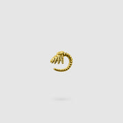 This finely detailed ear cuff from the PHAOS collection offers an innovative reinterpretation of the ancient granulation technique, brought to life through digital design and modern craftsmanship. Its sculptural form wraps elegantly around the ear without the need for a piercing, creating a bold yet refined statement. Available in your choice of gold-plated brass or .925 silver, it’s a contemporary piece that merges heritage with high-tech precision.