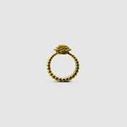 A bold reinterpretation of a timeless halo design, this ring fuses the ancient granulation technique with contemporary digital craftsmanship. Its sculptural silhouette and delicate design details make it a standout piece, expertly crafted in gold-plated brass or .925 silver as part of the PHAOS collection.
