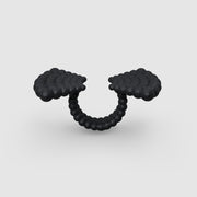 Statement ring 3D printed from bioplastic using advanced technology and hand finished in your choice of colour. Designed with an open band, this ring is a whimsical masterclass in symmetry and symbolism.