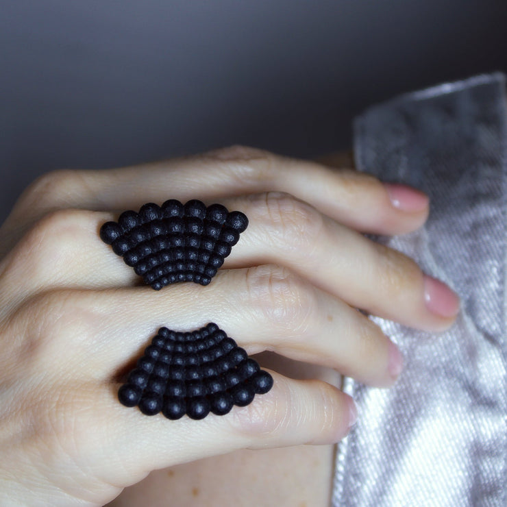 Statement ring 3D printed from bioplastic using advanced technology and hand finished in your choice of colour. Designed with an open band, this ring is a whimsical masterclass in symmetry and symbolism.
