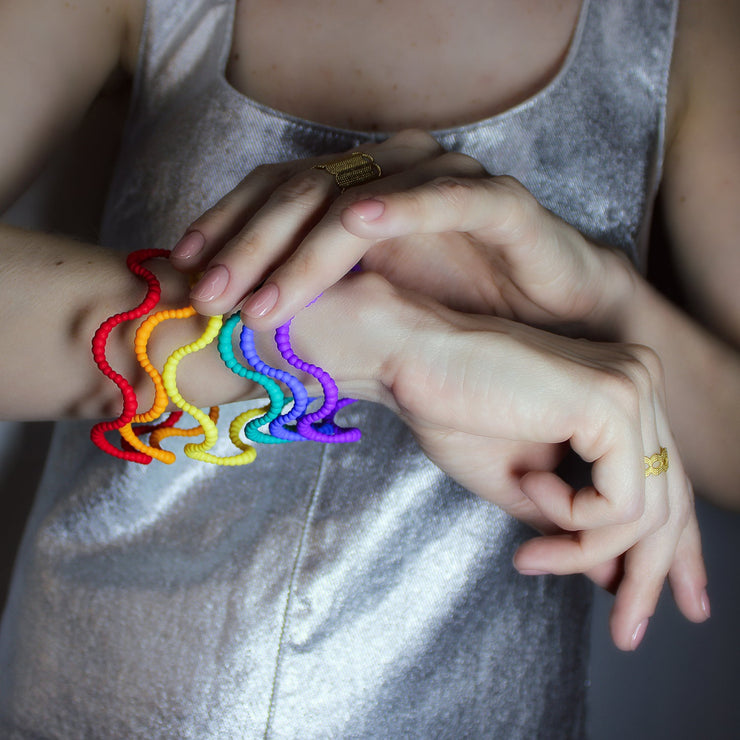 Set of 6 bangles 3D printed from bioplastic and hand-dyed in the sequence of hues commonly described as making up a rainbow; red, orange, yellow, green, blue, and violet. The bangles are available as a set or separately so you can choose the colour that best suits your personal style and personality.