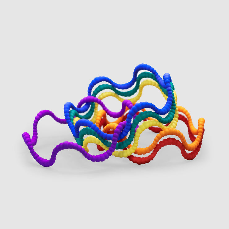 Set of 6 bangles 3D printed from bioplastic and hand-dyed in the sequence of hues commonly described as making up a rainbow; red, orange, yellow, green, blue, and violet. The bangles are available as a set or separately so you can choose the colour that best suits your personal style and personality.