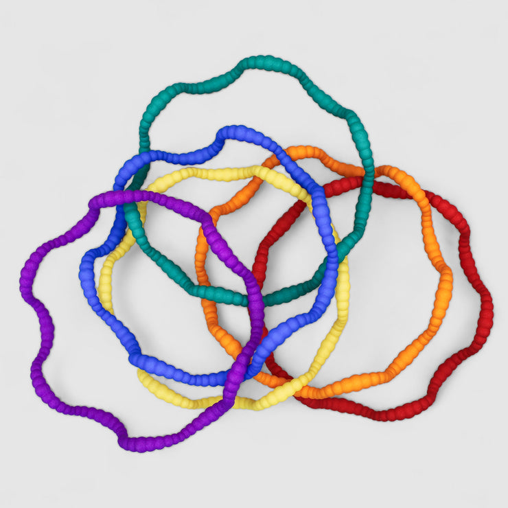 Set of 6 bangles 3D printed from bioplastic and hand-dyed in the sequence of hues commonly described as making up a rainbow; red, orange, yellow, green, blue, and violet. The bangles are available as a set or separately so you can choose the colour that best suits your personal style and personality.