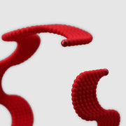 This lightweight cuff bracelet from the PHAOS collection is crafted from hand-dyed, 3D printed bioplastic and accented with glass pearls. Made from a renewable, plant-based polyamide derived from vegetable oil, each piece is hand-finished in your choice of colour; blending sustainable innovation with bold, contemporary design.