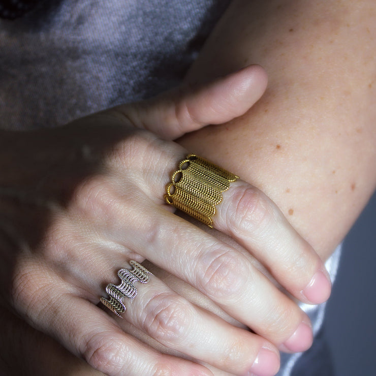 This intricate ring from the PHAOS collection is an innovative approach to the ancient technique of granulation, reimagined through digital design. Available in gold plated brass, silver .925 or gold plated silver .925