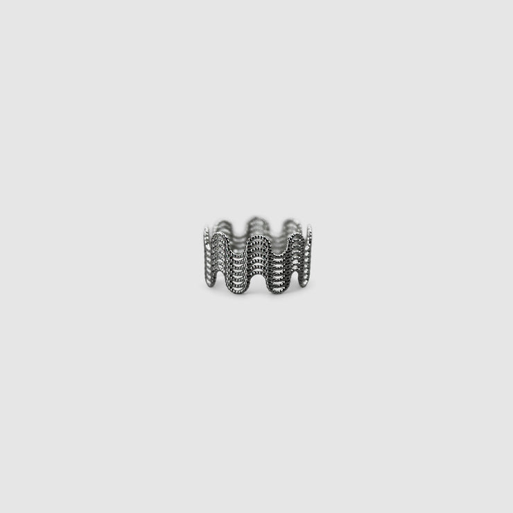This intricate ring from the PHAOS collection is an innovative approach to the ancient technique of granulation, reimagined through digital design. Available in gold plated brass, silver .925 or gold plated silver .925