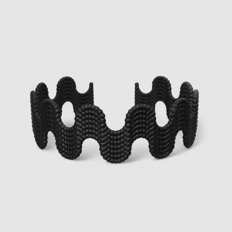 This statement chocker is crafted using advanced technology and hand finished in your choice of colour. Its material is a bioplastic polyamide powder made out of renewable resources that come from vegetable oil.