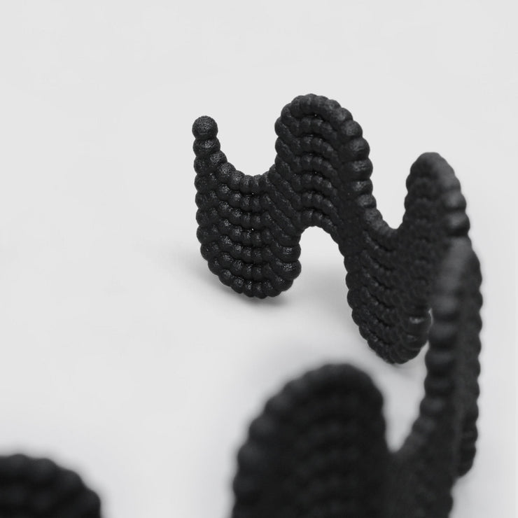 This statement chocker is crafted using advanced technology and hand finished in your choice of colour. Its material is a bioplastic polyamide powder made out of renewable resources that come from vegetable oil.