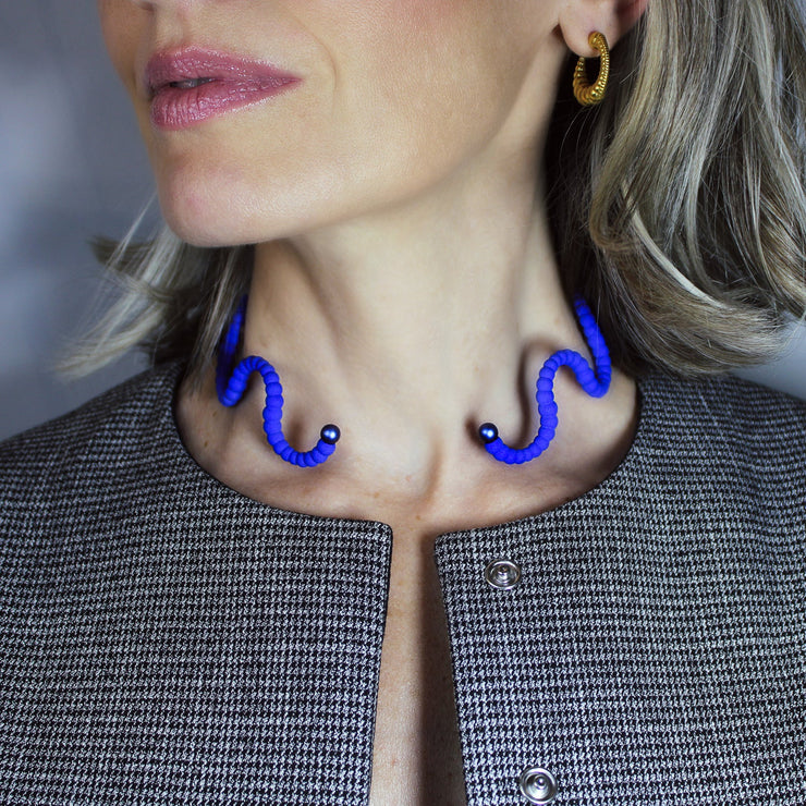 A contemporary statement piece, this choker is crafted from renewable bioplastic polyamide derived from vegetable oil and hand-finished in your choice of colour. Lightweight yet impactful, it sits elegantly at the neckline - striking in its simplicity.