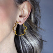 These intricate hoop earrings from the PHAOS collection are an innovative approach to the ancient technique of granulation, reimagined through digital design. Available in gold plated brass, silver .925 or gold plated silver .925 featuring our signature comfortable post fastening for pierced ears.