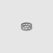 A contemporary twist on the ancient art of granulation, this refined stackable band ring reimagines traditional craftsmanship through a modern lens. Available in gold-plated brass, .925 silver, or gold-plated .925 silver, each ring features a subtly textured surface that echoes the precision and beauty of historical techniques via digital design. Designed to be worn alone for understated elegance or stacked for a bolder layered look - wear two or more together to create your own sculptural statement.