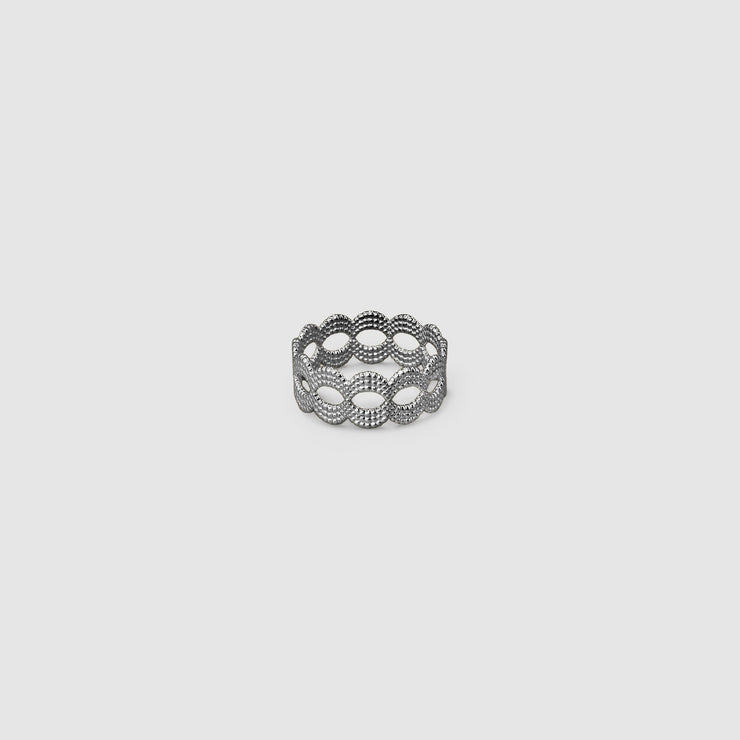 A contemporary twist on the ancient art of granulation, this refined stackable band ring reimagines traditional craftsmanship through a modern lens. Available in gold-plated brass, .925 silver, or gold-plated .925 silver, each ring features a subtly textured surface that echoes the precision and beauty of historical techniques via digital design. Designed to be worn alone for understated elegance or stacked for a bolder layered look - wear two or more together to create your own sculptural statement.