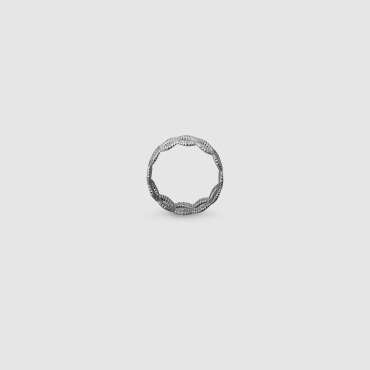 A contemporary twist on the ancient art of granulation, this refined stackable band ring reimagines traditional craftsmanship through a modern lens. Available in gold-plated brass, .925 silver, or gold-plated .925 silver, each ring features a subtly textured surface that echoes the precision and beauty of historical techniques via digital design. Designed to be worn alone for understated elegance or stacked for a bolder layered look - wear two or more together to create your own sculptural statement.