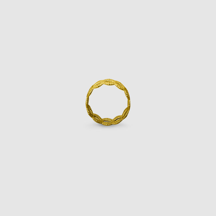 A contemporary twist on the ancient art of granulation, this refined stackable band ring reimagines traditional craftsmanship through a modern lens. Available in gold-plated brass, .925 silver, or gold-plated .925 silver, each ring features a subtly textured surface that echoes the precision and beauty of historical techniques via digital design. Designed to be worn alone for understated elegance or stacked for a bolder layered look - wear two or more together to create your own sculptural statement.