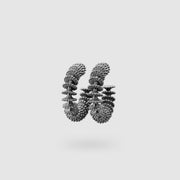 Our best selling hoop earrings from the PHAOS collection are crafted in gold plated brass, silver .925 or gold plated silver .925 and feature a playful yet delicate pattern. Decisively designed to enhance your everyday signature style. Finished with our signature post fastening for all-day comfort on pierced ears.
