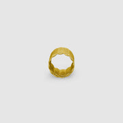 A seriously chunky ring from the PHAOS collection crafted in gold plated brass, silver .925 or gold plated silver .925. As this is a wide fitting ring, it’s always best to size up on your usual ring size. Featuring a contemporary twist to the ancient technique of granulation, it has a lovely feel and looks stunning on any finger.