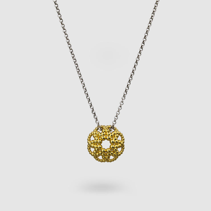 An artfully detailed pendant with a striking geometric form, crafted from gold-plated brass and paired with a .925 silver chain from the PHAOS collection. Make a subtle statement by layering it along with other pieces. Bold yet delicate, this pendant necklace makes the perfect gift.