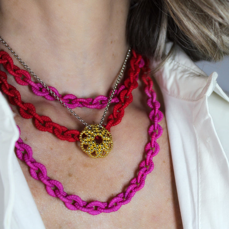 An artfully detailed pendant with a striking geometric form, crafted from gold-plated brass and paired with a .925 silver chain from the PHAOS collection. Make a subtle statement by layering it along with other pieces. Bold yet delicate, this pendant necklace makes the perfect gift.