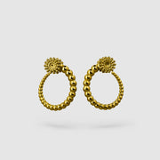 Sleek yet full of character, these wave hoop earrings from the PHAOS collection showcase a fluid, playful pattern with a refined touch. Available in gold-plated brass or .925 silver, they’re designed to add a hint of shine and movement to your everyday look. Finished with our signature post fastening for a secure, all-day comfortable fit on pierced ears.