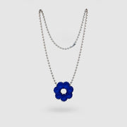 Contemporary and expressive, this pendant from the PHAOS collection showcases a detailed, geometric design crafted from bioplastic and suspended from a .925 silver chain. Wear it solo for a refined statement or layer it to elevate your daily style.
