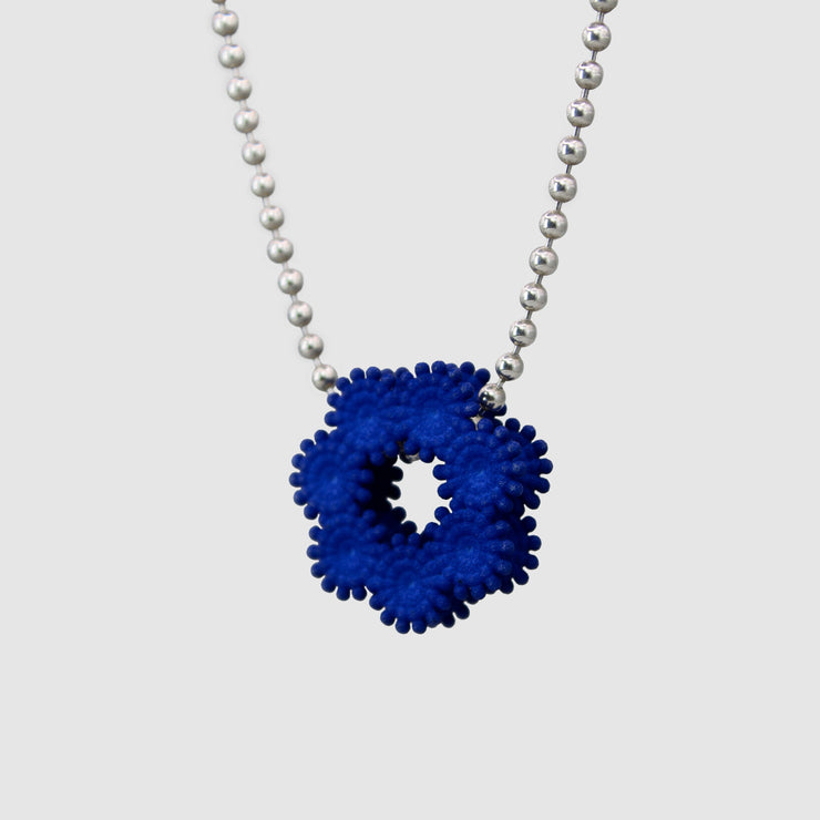Contemporary and expressive, this pendant from the PHAOS collection showcases a detailed, geometric design crafted from bioplastic and suspended from a .925 silver chain. Wear it solo for a refined statement or layer it to elevate your daily style.
