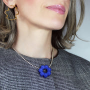 Contemporary and expressive, this pendant from the PHAOS collection showcases a detailed, geometric design crafted from bioplastic and suspended from a .925 silver chain. Wear it solo for a refined statement or layer it to elevate your daily style.
