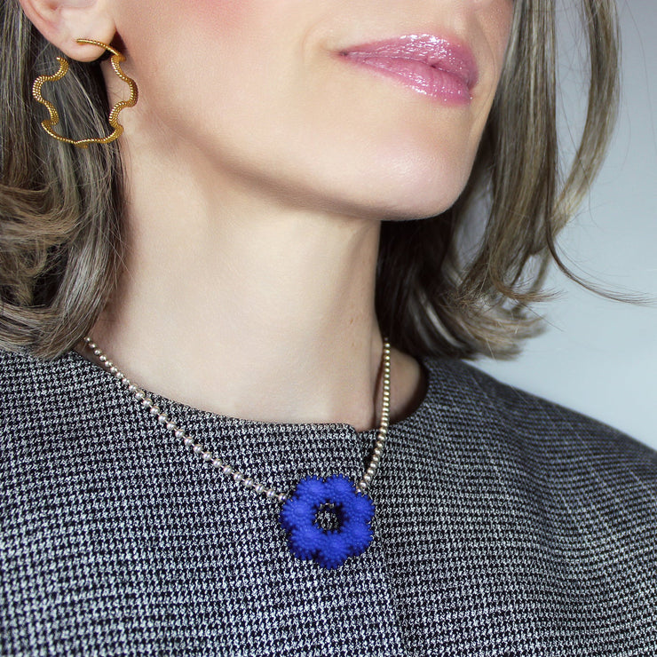 Contemporary and expressive, this pendant from the PHAOS collection showcases a detailed, geometric design crafted from bioplastic and suspended from a .925 silver chain. Wear it solo for a refined statement or layer it to elevate your daily style.
