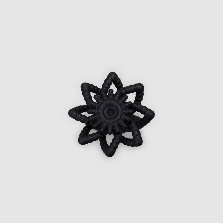 An expressive statement piece with a sculptural feel, this cocktail ring offers a contemporary take on the ancient art of granulation, brought to life through advanced 3D printing. It’s crafted from a strong, biosourced plastic and hand-dyed in your choice of colour.