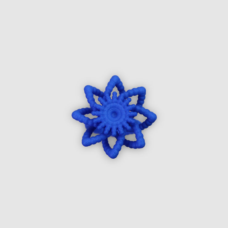 An expressive statement piece with a sculptural feel, this cocktail ring offers a contemporary take on the ancient art of granulation, brought to life through advanced 3D printing. It’s crafted from a strong, biosourced plastic and hand-dyed in your choice of colour.