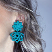 Feather-light and full of movement, these earrings are crafted from 3D-printed, hand-dyed bioplastic and finished with our signature .925 silver post fastening for a secure, all-day comfortable fit. Their bold geometric form makes a striking statement - perfectly balanced when paired with a crisp white shirt and clean, minimalist tailoring.