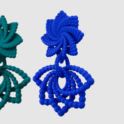 Feather-light and full of movement, these earrings are crafted from 3D-printed, hand-dyed bioplastic and finished with our signature .925 silver post fastening for a secure, all-day comfortable fit. Their bold geometric form makes a striking statement - perfectly balanced when paired with a crisp white shirt and clean, minimalist tailoring.