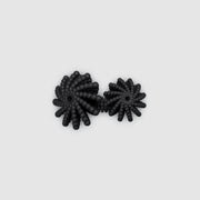 A bold statement piece with a sculptural edge, this open-band cocktail ring offers a contemporary take on the ancient art of granulation. 3D printed from a biosourced plastic known for its strength and distinctive sandy texture, each ring is hand-dyed and finished with care; a playful fusion of innovation and tradition.