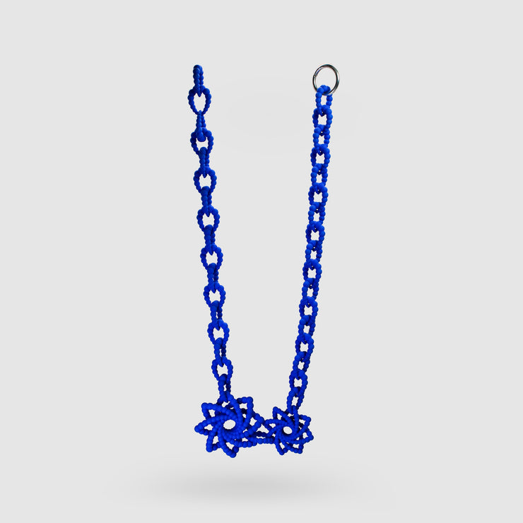 This ultimate statement of a necklace is the latest addition to the collection, crafted from durable bioplastic and hand dyed in your choice of colour. It features a silver .925 closure, adjusting the total length to best fit your look. From a white T-shirt to your favourite little-black-dress, this piece can dress up any outfit.
