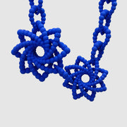 This ultimate statement of a necklace is the latest addition to the collection, crafted from durable bioplastic and hand dyed in your choice of colour. It features a silver .925 closure, adjusting the total length to best fit your look. From a white T-shirt to your favourite little-black-dress, this piece can dress up any outfit.