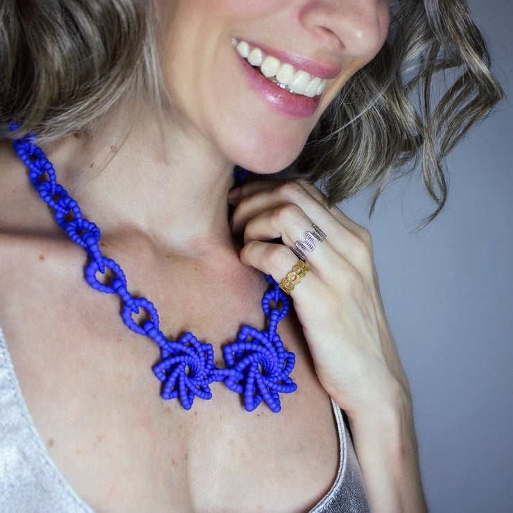 This ultimate statement of a necklace is the latest addition to the collection, crafted from durable bioplastic and hand dyed in your choice of colour. It features a silver .925 closure, adjusting the total length to best fit your look. From a white T-shirt to your favourite little-black-dress, this piece can dress up any outfit.