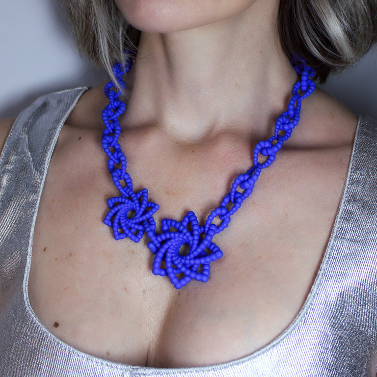 This ultimate statement of a necklace is the latest addition to the collection, crafted from durable bioplastic and hand dyed in your choice of colour. It features a silver .925 closure, adjusting the total length to best fit your look. From a white T-shirt to your favourite little-black-dress, this piece can dress up any outfit.