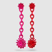 Crafted from ultra-light, 3D-printed bioplastic, these head-turning earrings are a true statement piece. Part of the captivating PHAOS collection, they feature a hand-dyed finish - one in bold red, the other in vibrant pink - bringing a playful contrast to any look. Finished with our signature post fastening for all-day comfort on pierced ears.