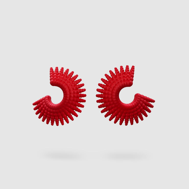 Intricate, vibrant, and easy-to-wear, this pair of pierced earrings adds a dash of colour to any outfit. Created with selective laser sintering technology from bioplastic, which is a biosourced strong material that has a sandy look, these earrings are hand finished with colour dye and our signature post fastening for all-day comfort on pierced ears.
