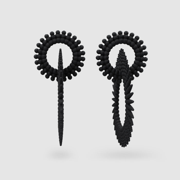 Crafted from ultra-light 3D printed bioplastic, these stunning earrings are true statement pieces. Part of the captivating PHAOS collection, their hand-dyed finish in a unique variety of vibrant colours, adds a touch of mystery and elegance to any look. Featuring our signature post fastening for all-day comfort on pierced ears.