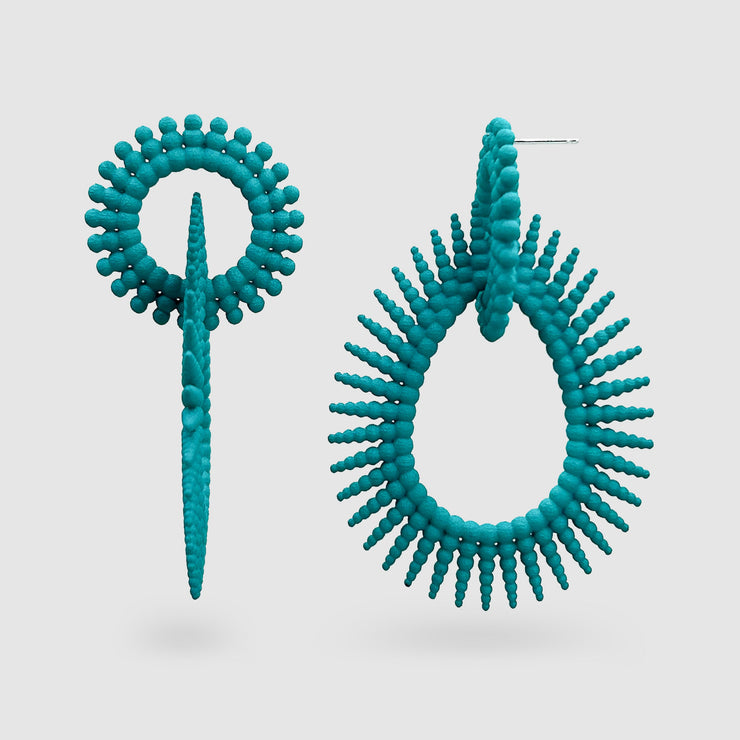 Crafted from ultra-light 3D printed bioplastic, these stunning earrings are true statement pieces. Part of the captivating PHAOS collection, their hand-dyed finish in a unique variety of vibrant colours, adds a touch of mystery and elegance to any look. Featuring our signature post fastening for all-day comfort on pierced ears.