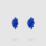 Striking and refined, these contemporary stud earrings are a vibrant reinterpretation of the ancient granulation technique, brought into the future through cutting-edge design. Crafted using selective laser sintering, each pair is made from durable, sand-textured bioplastic and hand-dyed for a rich burst of colour. Finished with our signature .925 silver post fastenings, they’re lightweight, easy to wear, and perfect for adding a touch of modern artistry to any look.