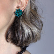 Striking and refined, these contemporary stud earrings are a vibrant reinterpretation of the ancient granulation technique, brought into the future through cutting-edge design. Crafted using selective laser sintering, each pair is made from durable, sand-textured bioplastic and hand-dyed for a rich burst of colour. Finished with our signature .925 silver post fastenings, they’re lightweight, easy to wear, and perfect for adding a touch of modern artistry to any look.