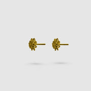 Delicate yet distinctive, these tiny stud earrings offer a modern take on a timeless form, inspired by the ancient art of granulation. Thoughtfully crafted in your choice of gold-plated brass or .925 silver, they’re versatile enough to elevate any look - whether worn alone or layered for added impact.