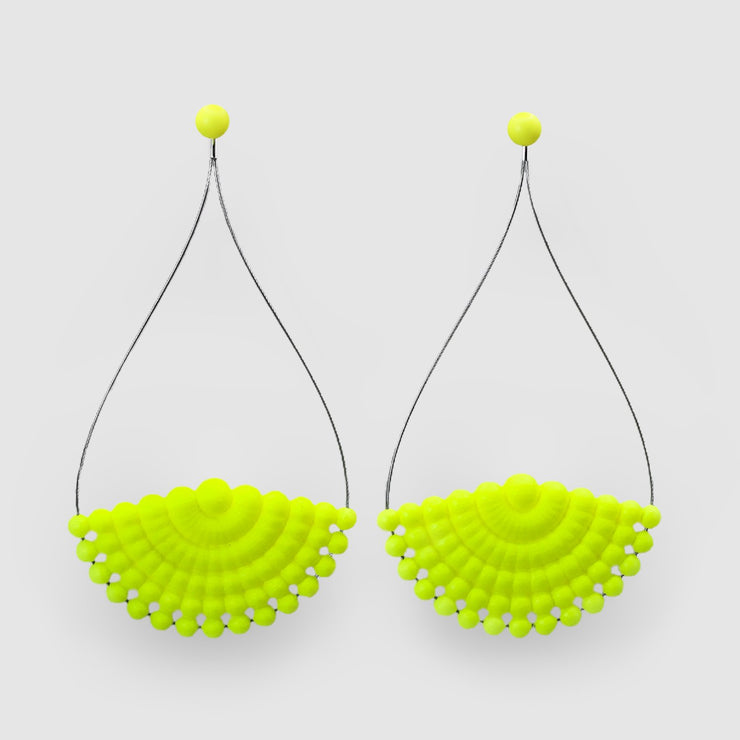 Lightweight earrings in bright neon yellow from 3D printed resin Swarovski pearls and silver .925 closure for pierced ears of the PHAOS collection. Wear the jacket and stud together for a sophisticated look or wear the neon yellow Swarovski studs on their own as part of your everyday signature style. 