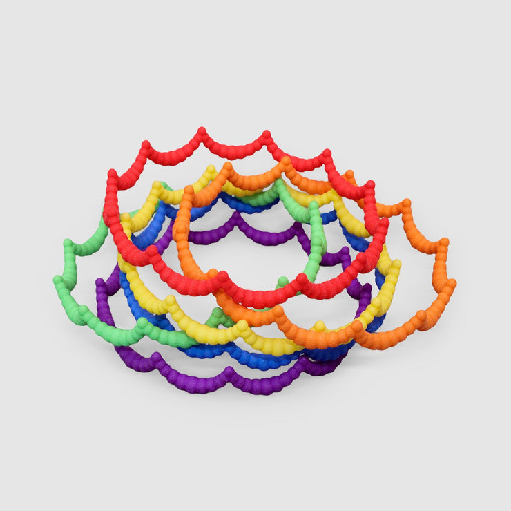 Set of 6 bangles 3D printed from nylon and hand-dyed in the sequence of hues commonly described as making up a rainbow red orange yellow green blue and violet. The bangles are available as a set or separately so you can choose the colour that best suits your personal style and personality.