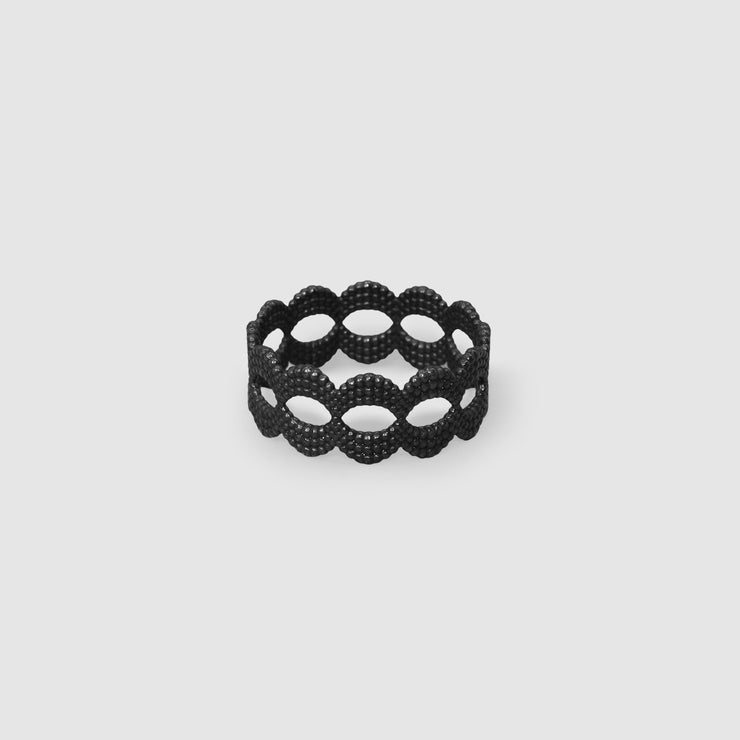 A contemporary twist to the ancient art of granulation  this stackable band ring is crafted in oxidised silver .925. Wear two together for extra impact and create a perfect layered look.